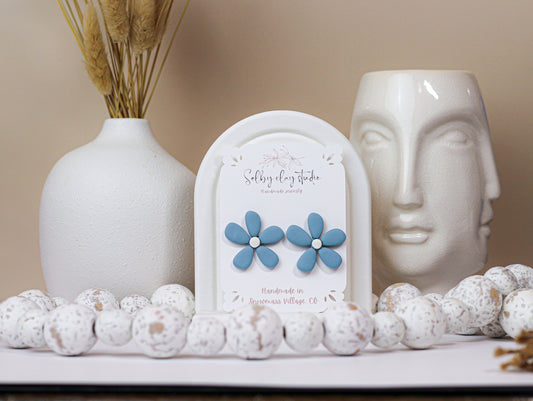 Blue bloom flower stud