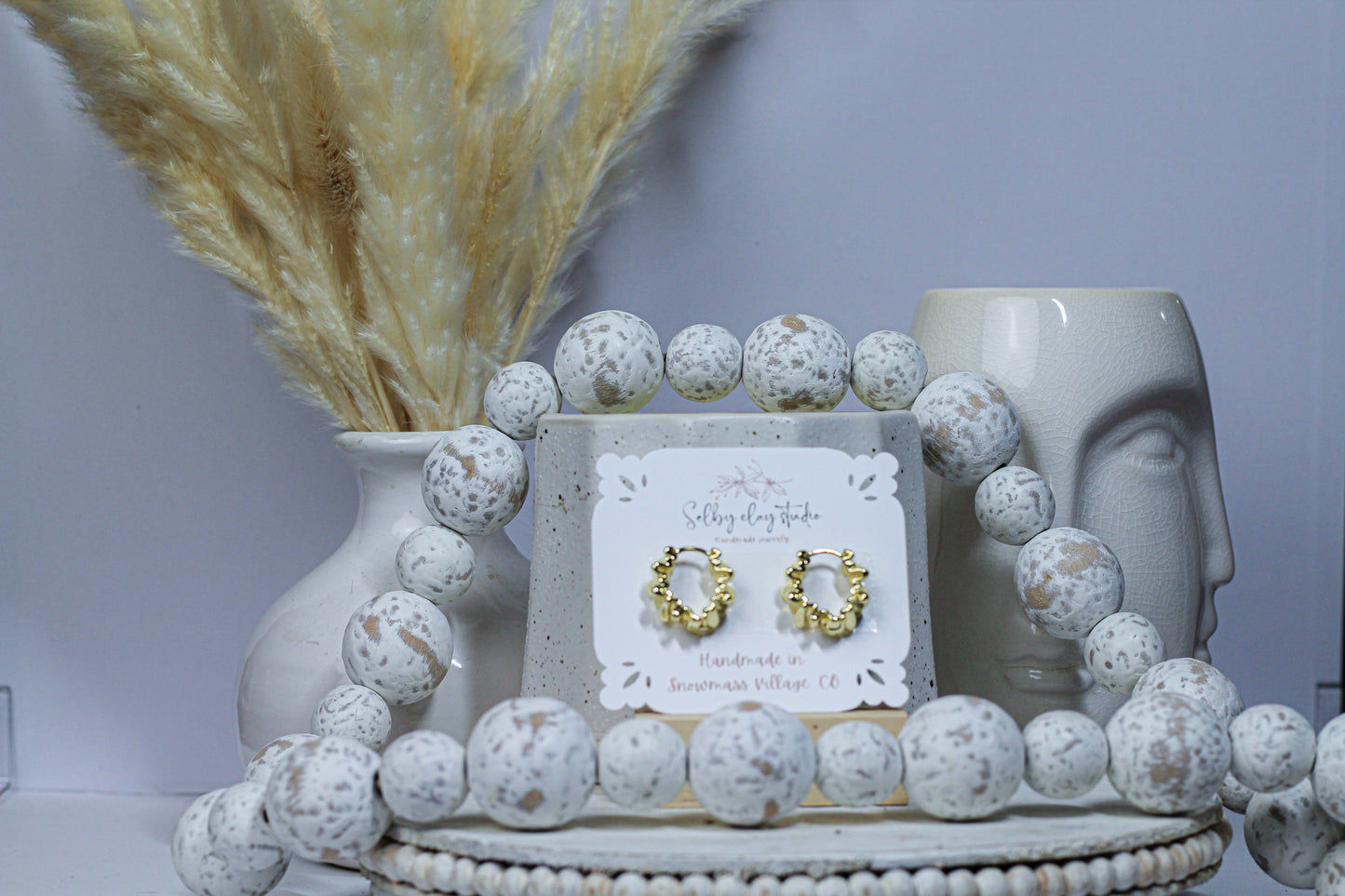 Swirl gold platted hoops