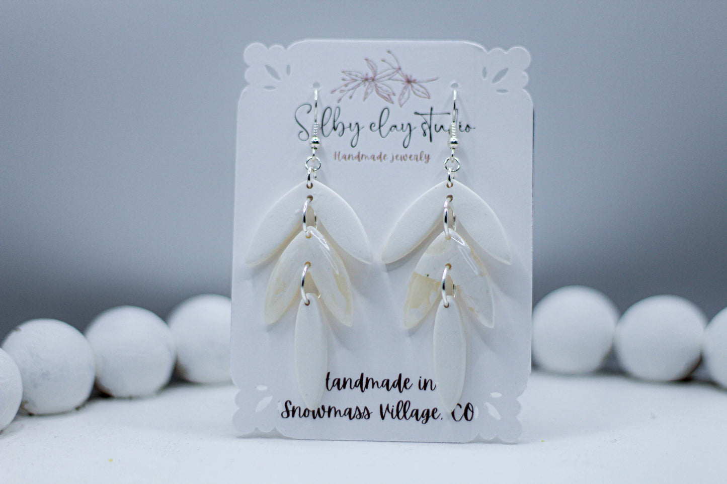 LA PERLA white dangles