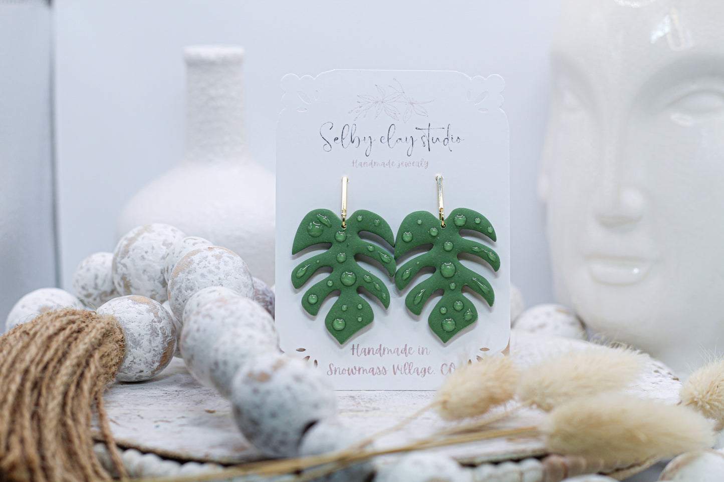 Botanical dark monstera water