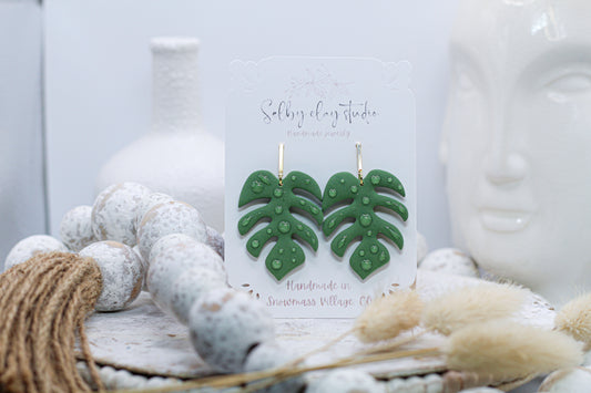 Botanical dark monstera water