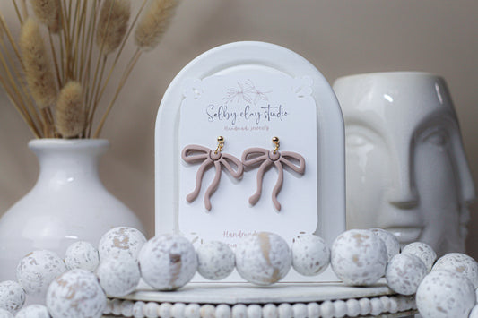 Rose nude dark bow