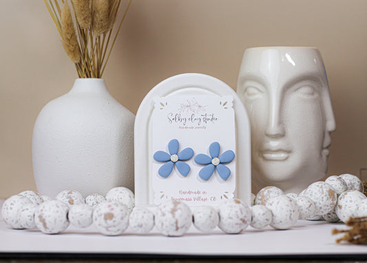 Blue bloom flower stud
