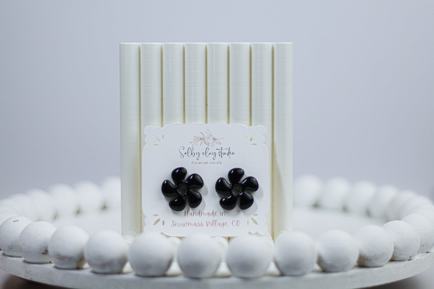 Galaxy black flower studs