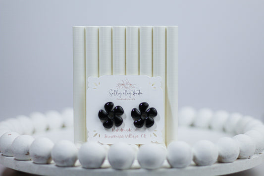 Galaxy black flower studs