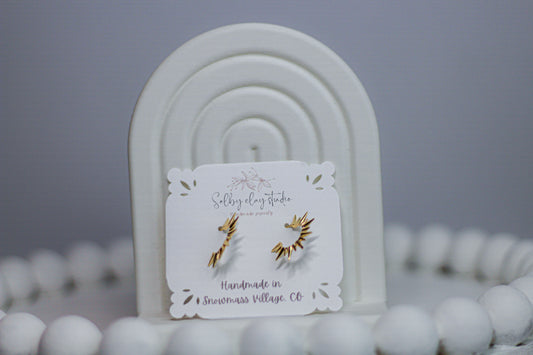 PA spike gold earrings