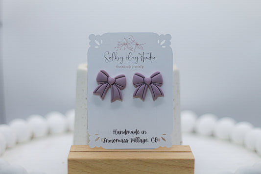 Cotton candy bow stud light